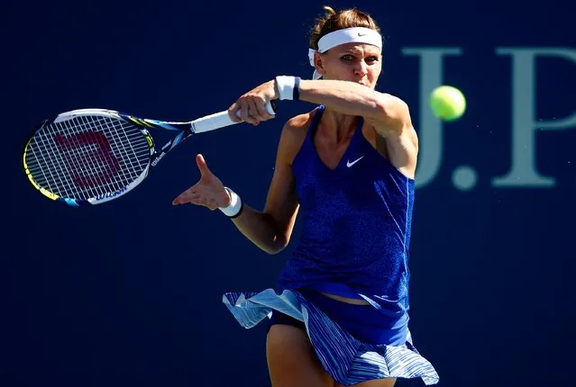 Lucie Safarova of the Czech Republic returns a shot against Alize Cornet of France during their women's singles third round match on Day Five of the 2014 US Open at the USTA Billie Jean King National Tennis Center on August 29, 2014 in the Flushing neighborhood of the Queens borough of New York City. (Photo by Julian Finney/Getty Images)