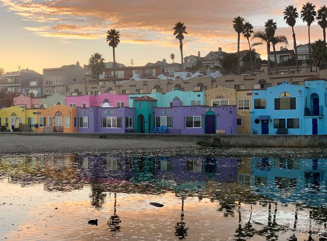 The sun sets over the Venetian Court apartments that face Monterey Bay on Capitola Beach on December 1, 2024, in Capitola, Calif. (Photo by Pamela Hassell/AP Photo)