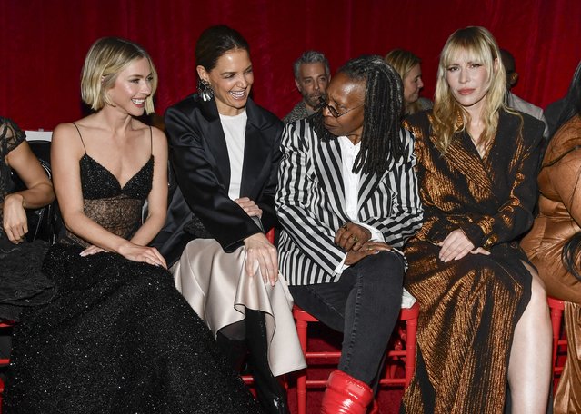 Julianne Hough, from left, Katie Holmes, Whoopi Goldberg and Natasha Bedingfield attend the Christian Siriano Fall/Winter 2025 fashion show at Chelsea Industrial during New York Fashion Week on Thursday, February 6, 2025, in New York. (Photo by Evan Agostini/Invision/AP Photo)