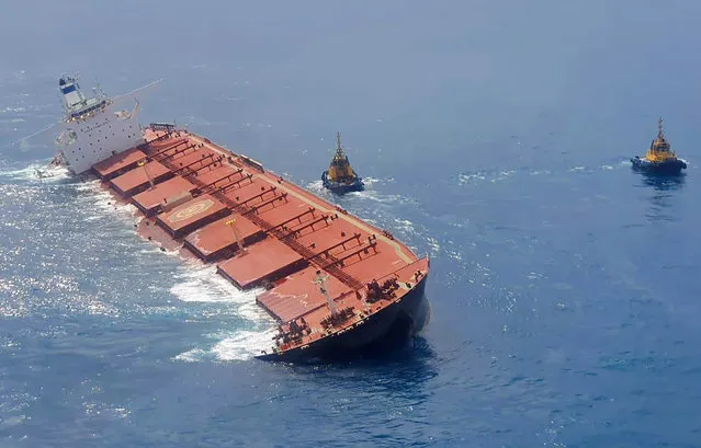 This February 27, 2020 photo released by the Brazilian Navy shows cargo ship Stellar Banner partially emerged offshore of Sao Luis in Maranhao state, Brazil. The cargo ship grounded off the coast of Brazil has begun leaking oil, the country's environmental enforcement agency said Friday. (Photo by Brazilian Navy via AP Photo)
