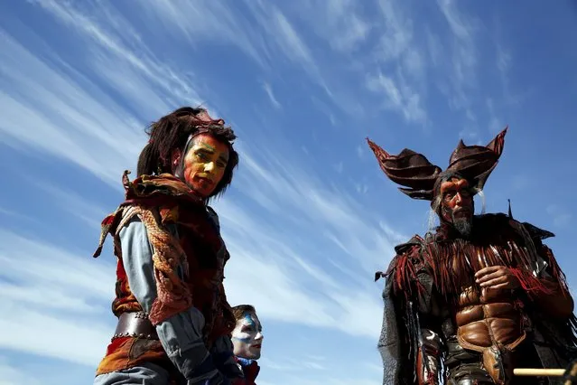 Performers take part in a parade during the annual Cervantes market (Mercado Cervantino) in the hometown of famous Spanish writer Miguel de Cervantes, Alcala de Henares, Spain, October 9, 2015. (Photo by Susana Vera/Reuters)