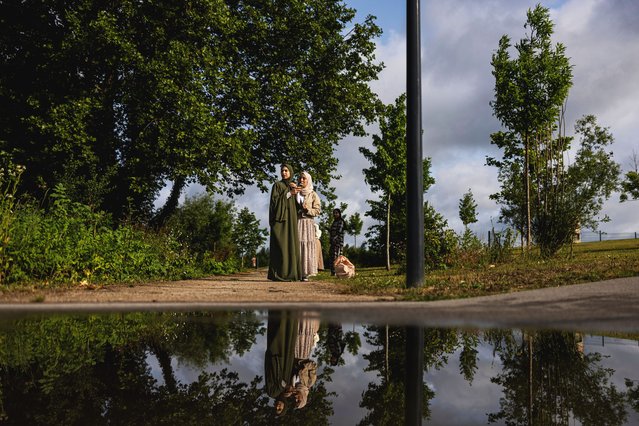 Muslim faithfuls gather to celebrate Eid al-Adha, the Muslim feast of sacrifice, in Bethune, northern France on June 6, 2025. Eid Al-Adha is celebrated each year by Muslims sacrificing various animals according to religious traditions, including cows, camels, goats and sheep. The festival marks the end of the Hajj pilgrimage to Mecca and commemorates Prophet Abraham's readiness to sacrifice his son to show obedience to God. (Photo by Sameer Al-Doumy/AFP Photo)