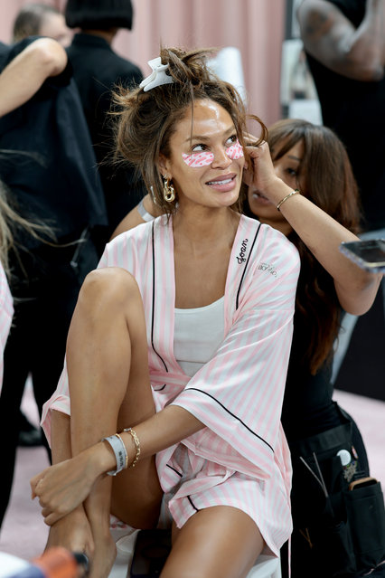 Fashion model Joan Smalls prepares backstage at the Victoria's Secret Fashion Show 2025 on October 15, 2025 in New York City. (Photo by Dimitrios Kambouris/Getty Images for Victoria's Secret)