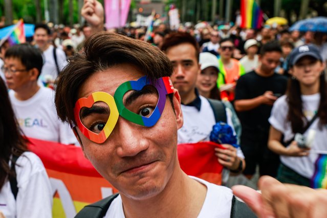 A person participates in the annual Taiwan Pride parade in Taipei, Taiwan, 25 october 2025. This year's theme, 'Beyond Links: More Than Clicks', examines online conversations about gender and the challenges LGBTQ+ individuals face in the digital age. (Photo by Ritchie B. Tongo/EPA)