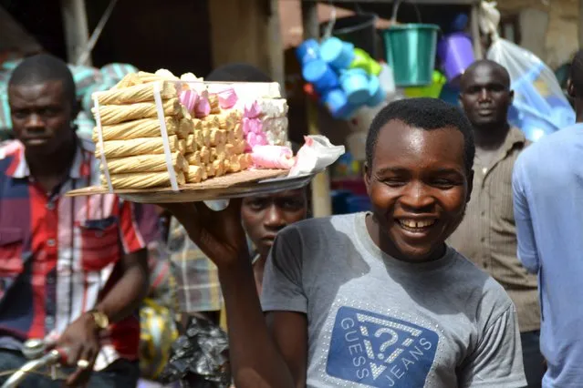 A man sells sweets at a market in Mubi, Adamawa State, Nigeria October 28, 2015. (Photo by Reuters/Stringer)