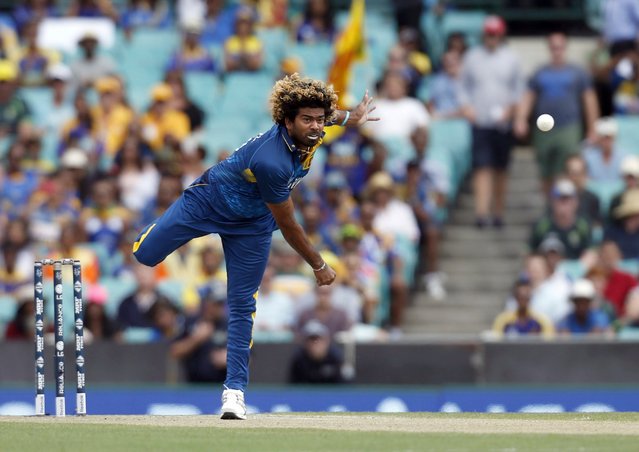 Sri Lanka's Lasith Malinga bowls to Australia's Aaron Finch during their Cricket World Cup match in Sydney, March 8, 2015.    REUTERS/Jason Reed (AUSTRALIA - Tags: SPORT CRICKET)
