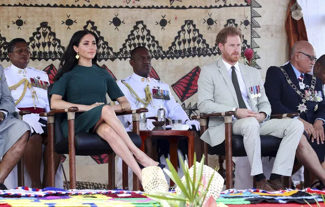 Britain's Prince Harry and Meghan, Duchess of Sussex attend an offical ceremony in Nadi, Fiji, Thursday, October 25, 2018. Britain's Prince Harry and his wife Meghan are on day 10 of their 16-day tour of Australia and the South Pacific. (Photo bt Chris Jackson/Pool Photo via AP Photo)