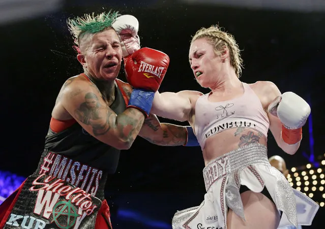 Heather Hardy, right, punches Shelly Vincent during the 10th round of a WBO women's featherweight championship boxing match Saturday, October 27, 2018, in New York. Hardy won the fight. (Photo by Frank Franklin II/AP Photo)
