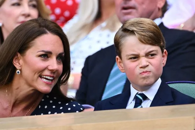 Britain's Catherine, Duchess of Cambridge (L) talks to her son Prince George as they attend the men's singles final tennis match between Serbia's Novak Djokovic and Australia's Nick Kyrgios on the fourteenth day of the 2022 Wimbledon Championships at The All England Tennis Club in Wimbledon, southwest London, on July 10, 2022. (Photo by Sebastien Bozon/AFP Photo)