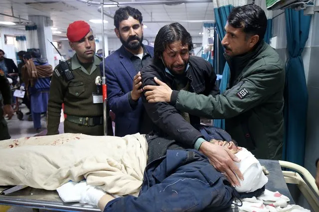 The relative of a victim of a blast that targeted a police vehicle near the Afghan border reacts in Peshawar, Pakistan, 08 January 2024. Five police officers were killed and nearly two dozen others wounded in an explosive attack targeting their vehicle during a polio vaccination drive in northwestern Pakistan, police said. The blast occurred in Peshawar, a tribal district in Khyber Pakhtunkhwa province, as the vaccination campaign began. No group has claimed responsibility for the attack, but the Pakistani Taliban has previously targeted polio vaccination workers and security officials. Resistance to the immunization drive has grown due to historical CIA involvement and misinformation spread by religious leaders. Both Pakistan and Afghanistan are yet to be declared free of the wild poliovirus type 1, with Pakistan reporting a considerable reduction in polio cases in 2023. The attack on the vaccination team comes amid a surge in violent incidents in Pakistan, with over 600 attacks and more than 950 fatalities reported in 2023, according to data compiled by the Pakistan Institute of Conflict and Security Studies, a research organization based in Islamabad. (Photo by Arshad Arbab/EPA/EFE)