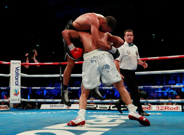Chris Eubank Jr throws down James DeGale before having a point deducted by the referee during the IBO World Super Middleweight Title fight between James DeGale and Chris Eubank Jr at The O2 Arena on February 23, 2019 in London, England. (Photo by Andrew Couldridge/Action Images via Reuters)