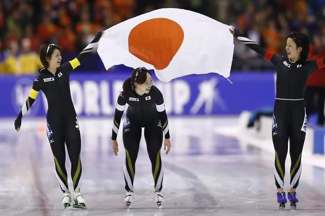 Team Japan celebrates winning the women's team pursuit race of the Speedskating World Cup final at Thialf ice rink in Heerenveen, Netherlands, Saturday, March 12, 2016. (Photo by Peter Dejong/AP Photo)