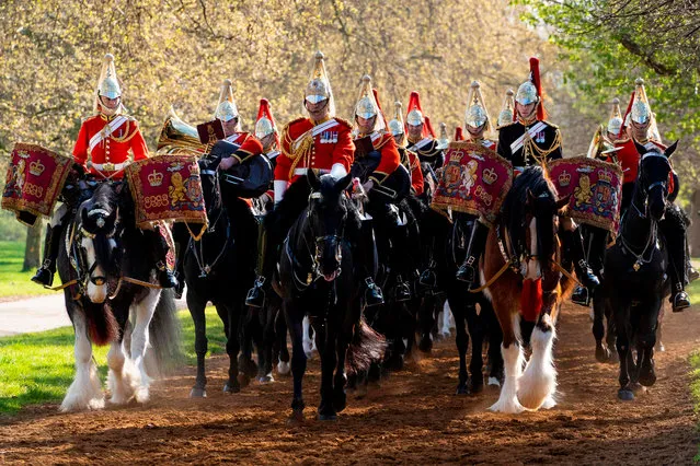 Members of the Household Cavalry Mounted Regiment take part in the annual inspection in Hyde Park, central London on April 11, 2019. The Major General's Inspection is the annual validation of the ability of the regiment to conduct State Ceremonial duties for the year. (Photo by Niklas Halle'n/AFP Photo)
