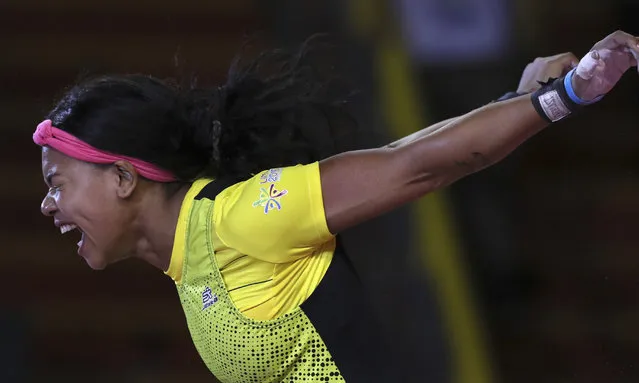 Angie Palacios of Ecuador celebrates lifting 105 kg during the women's snatch 64 kg weightlifting event at the Pan American Games in Lima, Peru, Monday, July 29, 2019. (Photo by Fernando Llano/AP Photo)