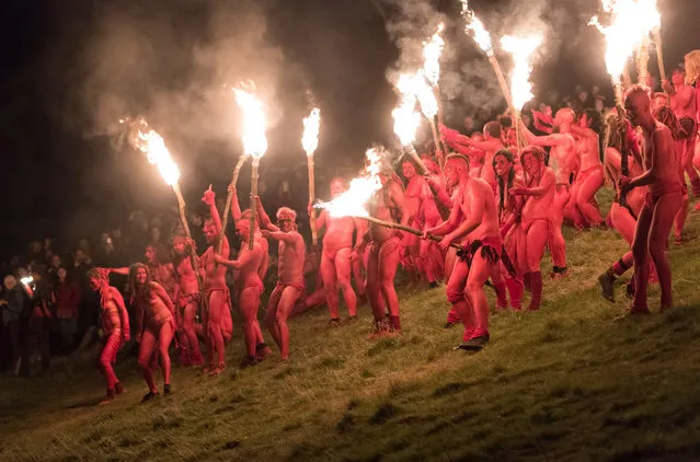 Beltane Fire Society performers celebrate the coming of summer by participating in the Beltane Fire Festival on Calton Hill on April 30, 2017 in Edinburgh, United Kingdom. The event, first organized in the mid-1980's, celebrates the ending of winter and is a revival of the ancient Celtic and Pagan festival of Beltane, the Gaelic name for the month of May. (Photo by Roberto Ricciuti/Getty Images)