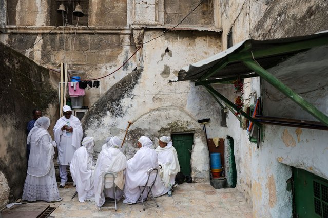 Christian Ethiopian pilgrims attend the Palm Sunday procession at the roof of the Church of the Holy Sepulcher  in the Old city of Jerusalem, 09 April 2023. Palm Sunday for Christian devotees symbolically marks the biblical account of the entry of Jesus Christ into Jerusalem, signaling the start of the Holy Week. (Photo by Abir Sultan/EPA/EFE/Rex Features/Shutterstock)