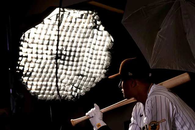 San Diego Padres' Manny Machado poses for a photographer on photo day during spring training baseball practice Thursday, March 17, 2022, in Peoria, Ariz. (Photo by Charlie Riedel/AP Photo)