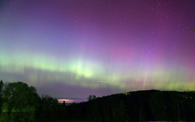 The Northern Lights as seen from the Stormville Mountain rest stop on Interstate 84 in East Fishkill, NY, early Saturday morning, May 11, 2024. (Photo by Frank Becerra Jr./The Journal News via USA TODAY Network)