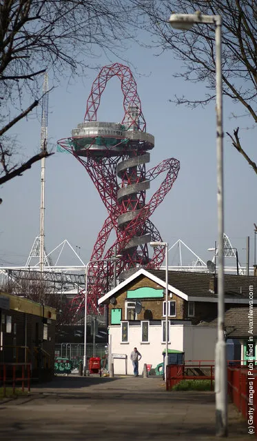 The ArcelorMittal Orbit viewing platform and the main Olympic Stadium, which are visible to residents on the Carpenters Housing Estate near Stratford