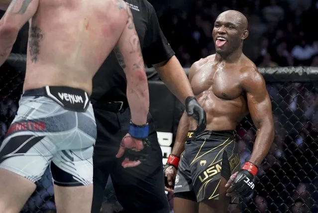 Kamaru Usman reacts against Colby Covington during a welterweight mixed martial arts championship bout at UFC 268, Sunday, November 7, 2021, in New York. (Photo by Corey Sipkin/AP Photo)