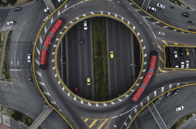 Aerial view of a highway in Bogota on April 10, 2022. (Photo by Juan Barreto/AFP Photo)