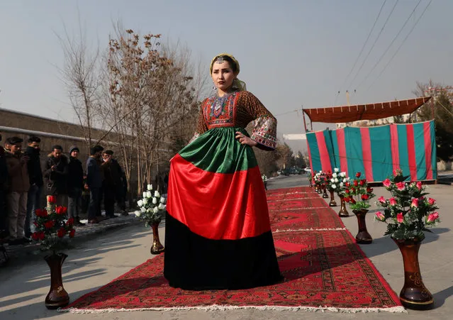 An Afghan model presents a traditional costume during the first street fashion show in Kabul, Afghanistan on January 23, 2020. (Photo by Omar Sobhani/Reuters)
