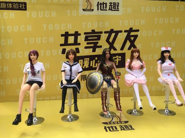 This handout picture taken on September 14, 2017 released by Touch shows rentable s*x dollS on display on a promotional event in Beijing. (Photo by AFP Photo/Touch/HO)