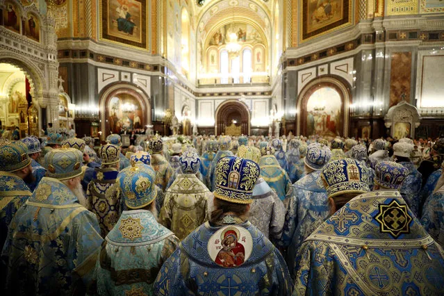 The leaders of the Orthodox Churches and archpriests of the Russian Orthodox Church attend a liturgy at the Cathedral of Christ the Saviour on the feastday of the Presentation of Virgin Mary in the Temple in Moscow, Russia on December 4, 2017. The liturgy celebrates the 100 th anniversary of the enthronement of Saint Patriarch Tikhon of Moscow. (Photo by Mikhail Tereshchenko/TASS)
