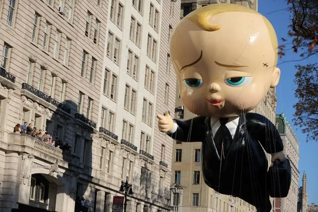 The Boss Baby balloon flies during the 96th Macy's Thanksgiving Day Parade in Manhattan, New York City, U.S., November 24, 2022. (Photo by Andrew Kelly/Reuters)