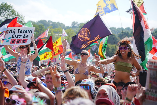 Crowds watch Kneecap performing on the West Holts Stage during the Glastonbury Festival at Worthy Farm in Somerset, UK on Saturday, June 28, 2025. (Photo by Ben Birchall/PA Wire)