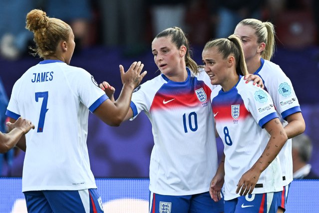 England's midfielder #08 Georgia Stanway celebrates after scoring the second goal of the match with England's forward #07 Lauren James, who scored the first goal, and England's midfielder #10 Ella Toon during the UEFA Women's Euro 2025 Group D football match between England and The Netherlands at the Letzigrund Stadium in Zurich, on July 9 2025. (Photo by Fabrice Coffrini/AFP Photo)