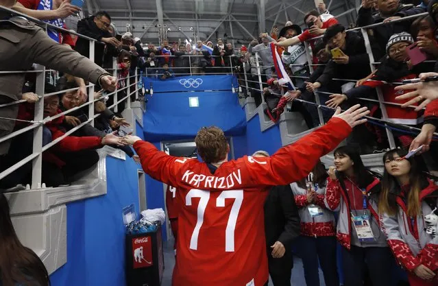 Olympic Athlete from Russia Kirill Kaprizov reacts with supporters after Russia won in the men' s gold medal ice hockey match between the Olympic Athletes from Russia and Germany during the Pyeongchang 2018 Winter Olympic Games at the Gangneung Hockey Centre in Gangneung on February 25, 2018. (Photo by Kim Kyung-Hoon/Reuters)