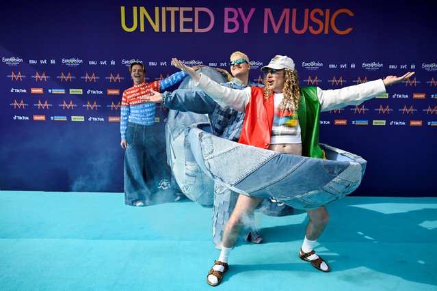 Finnish visual artist and DJ Teemu Keisteri, also known as Windows95man and representing Finland in the Eurovision Song Contest, poses with Finnish singer Henri Piispanen on the turquoise carpet before the before the opening ceremony for the 68th edition of the Eurovision Song Contest ESC at Malmo Live concert venue, in Malmo, Sweden, on May 5, 2024. (Photo by Jessica Gow/TT News Agency via Reuters)