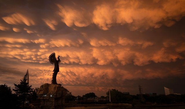 A formation of mammatus clouds fills the sky over north-east Kansas on April 30, 2024, after severe storms and a few tornadoes crossed the state. (Photo by Travis Heying/The Wichita Eagle/AP Photo)