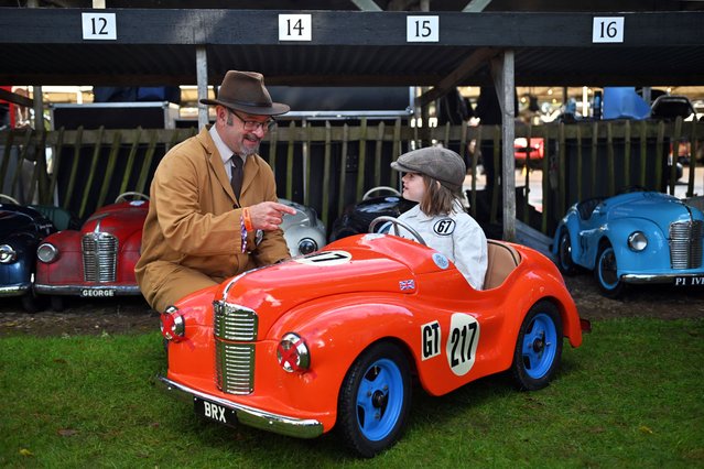 Young race meet goer Indie, and parent at day-two of the Goodwood Revival at the Goodwood Motor Circuit in Chichester, West Sussex, UK on Saturday, September 13, 2025. (Photo by Jas Lehal/PA Media Assignments)