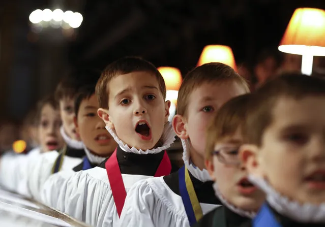 St Paul's Choristers rehearse in the cathedral in London, Monday, December 22, 2014,  preparing for their busiest days of the year. (Photo by Kirsty Wigglesworth/AP Photo)