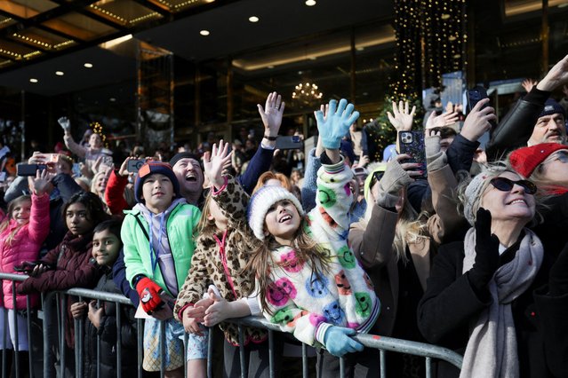 People attend the 2025 Macy's Thanksgiving Day Parade during the Macy's Thanksgiving Day Parade 2025, in New York City, U.S., November 27, 2025. (Photo by Jeenah Moon/Reuters)