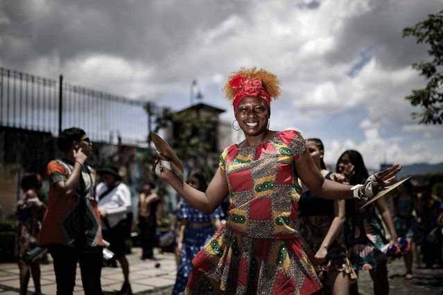 Participants take part in the celebrations of the 26th Flower Festival of the African Diaspora (FFDA) celebrations in San Jose, Costa Rica, 17 August 2024. These festivities are part of the commemoration of the Afro-Costa Rican culture. (Photo by Jeffrey Arguedas/EPA)