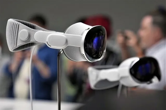 The Apple Vision Pro headset is displayed in a showroom on the Apple campus in Cupertino, Calif., at the company's annual developers conference, Monday, June 5, 2023. (Photo by Jeff Chiu/AP Photo)