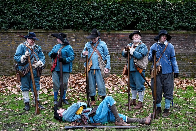 Historical reenactors from the English Civil War Society dressed as the King's Army gather and prepare to march down the Mall to commemorate the beheading of King Charles I in 1649 in London, Britain, on January 26, 2025. (Photo by Chris J. Ratcliffe/Reuters)