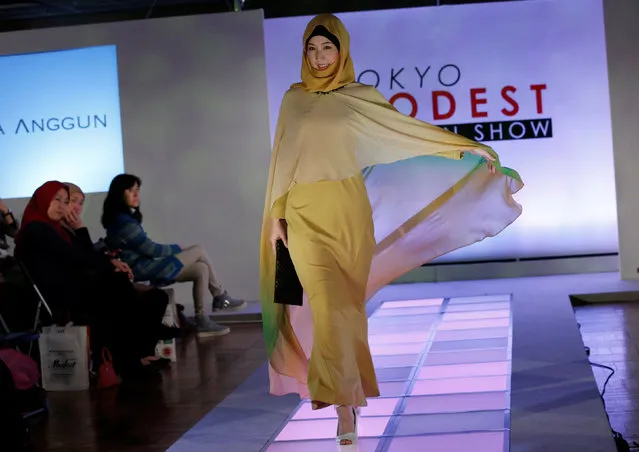A model presents a creation by brand Alia Anggun during Tokyo Modest Fashion Show, Muslim fashion show, at Halal Expo Japan in Tokyo, Japan, November 22, 2016. (Photo by Toru Hanai/Reuters)
