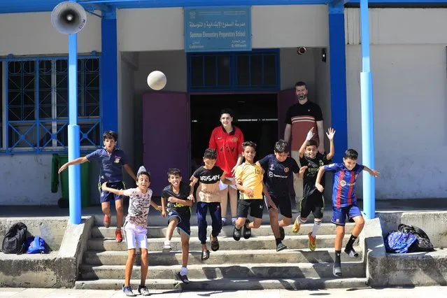 Palestinian boys jump during a soccer training session at a school run by the agency for Palestinian refugees, or UNRWA, at Ein el-Hilweh Palestinian refugee camp, in the southern port city of Sidon, Lebanon, Tuesday, June 20, 2023. Commissioner-General Philippe Lazzarini, the head of the U.N. agency for Palestinian refugees said Tuesday that without a new injection of funding, it is “likely or highly likely” that the agency will not be able to deliver some services or pay salaries by the fall. (Photo by Mohammed Zaatari/AP Photo)