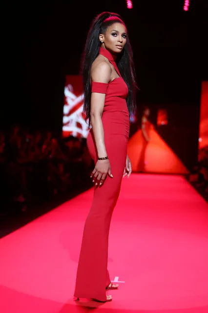 In this Thursday, February 12, 2015 photo released by Starpix, Ciara walks the runway at the Go Red for Women Red Dress Fashion Show at Lincoln Center in New York. (Photo by Kristina Bumphrey/AP Photo/Starpix)
