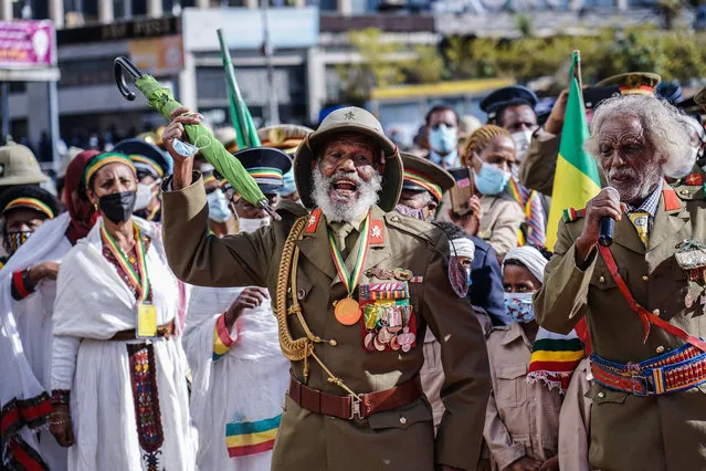 War Veterans gesture during the celebration of the 80th patriots' day at Meyazia 27 square in Addis Ababa, Ethiopia, on May 5, 2021. Patriots' Day (Arbegnoch Qen in Amharic) is a national holiday in Ethiopia that commemorates the end of the Italian occupation. On this day in 1941 the Italian control ended when Emperor Haile Selassie entered Addis Ababa on May 5th (Meyazia 27 in the Ethiopian calendar). (Photo by Amanuel Sileshi/AFP Photo)