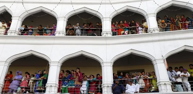Sikh devotees watch the Baisakhi festival at Panja Sahib shrine in Hassan Abdel April 13, 2015. (Photo by Caren Firouz/Reuters)