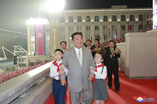 In this photo provided by the North Korean government, North Korean leader Kim Jong Un walks with children during a celebration of the nation’s 73rd anniversary at Kim Il Sung Square in Pyongyang, North Korea, early Thursday, September 9, 2021. Independent journalists were not given access to cover the event depicted in this image distributed by the North Korean government. The content of this image is as provided and cannot be independently verified. Korean language watermark on image as provided by source reads: “KCNA” which is the abbreviation for Korean Central News Agency. (Photo by Korean Central News Agency/Korea News Service via AP Photo)