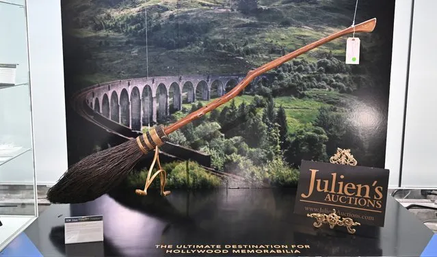 A production-made prop “Shooting Star” Hogwarts school broom from the 2001 film “Harry Potter and the Sorcerer's Stone” is displayed at Julien's Auctions in Beverly Hills, California, on December 12, 2022, ahead of the “Julien's Auctions and TCM Present: Icons & Idols: Hollywood”. The auction will take place in-person and online on December 17 and 18. (Photo by Frederic J. Brown/AFP Photo)