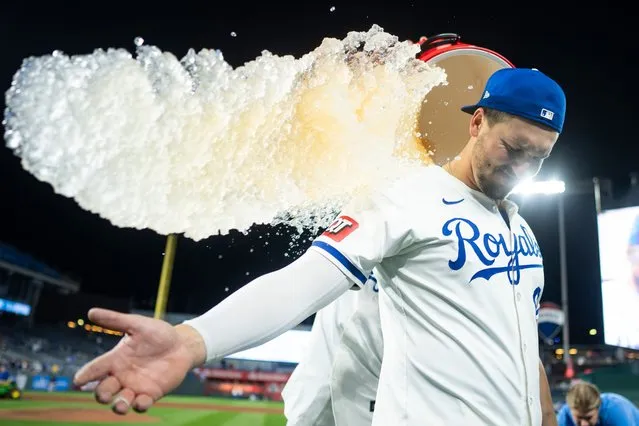 Vinnie Pasquantino #9 of the Kansas City Royals is doused with water by MJ Melendez #1 after defeating the Houston Astros at Kauffman Stadium on April 10, 2024 in Kansas City, Missouri. (Photo by Jay Biggerstaff/Getty Images)