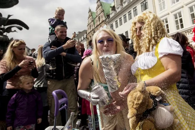 People take part in the Copenhagen Carnival parade May 23, 2015. (Photo by Jens Astrup/Reuters/Scanpix Denmark)