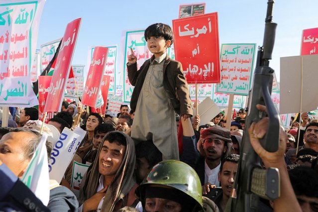 People supporting the Houthis, protest in a rally against the U.S.-led strikes on Houthi targets and continued Israeli strikes in the Gaza Strip, in Sanaa, Yemen on January 26, 2024. (Photo by Khaled Abdullah/Reuters)